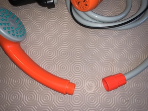 Shower head,  rubber washer and hose connector.